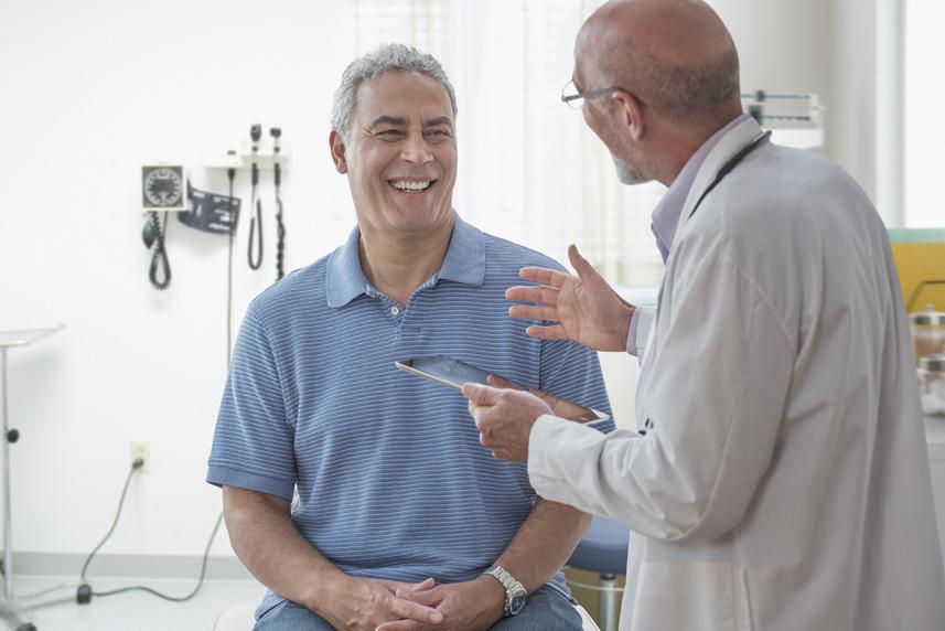 Man talking to doctor