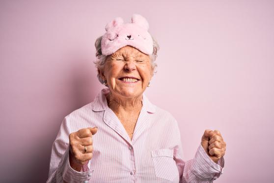 Image of senior woman in pajamas & sleep mask for how to help your heart every day